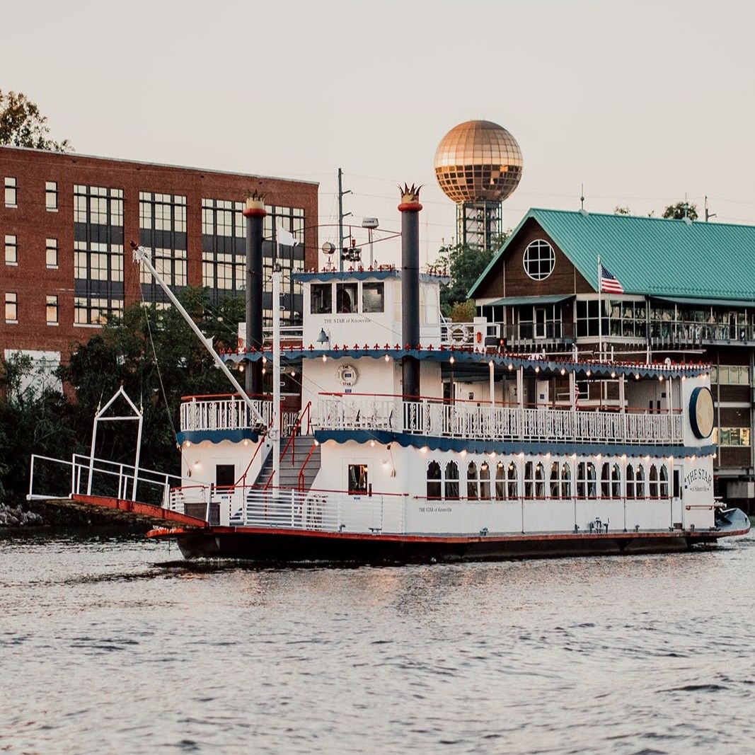 The Star of Knoxville Riverboat on the Tennessee River with the Sunsphere in the background
